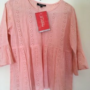 Cute peach baby doll top.  L but fits like an M.